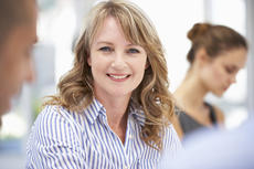 2194980-mid-age-businesswoman-in-meeting.jpg