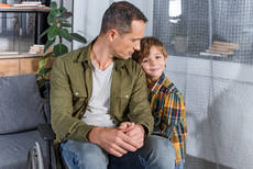 23148703-son-and-father-in-wheelchair.jpg