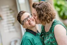 17813177-lesbian-couple-kissing-outdoors.jpg